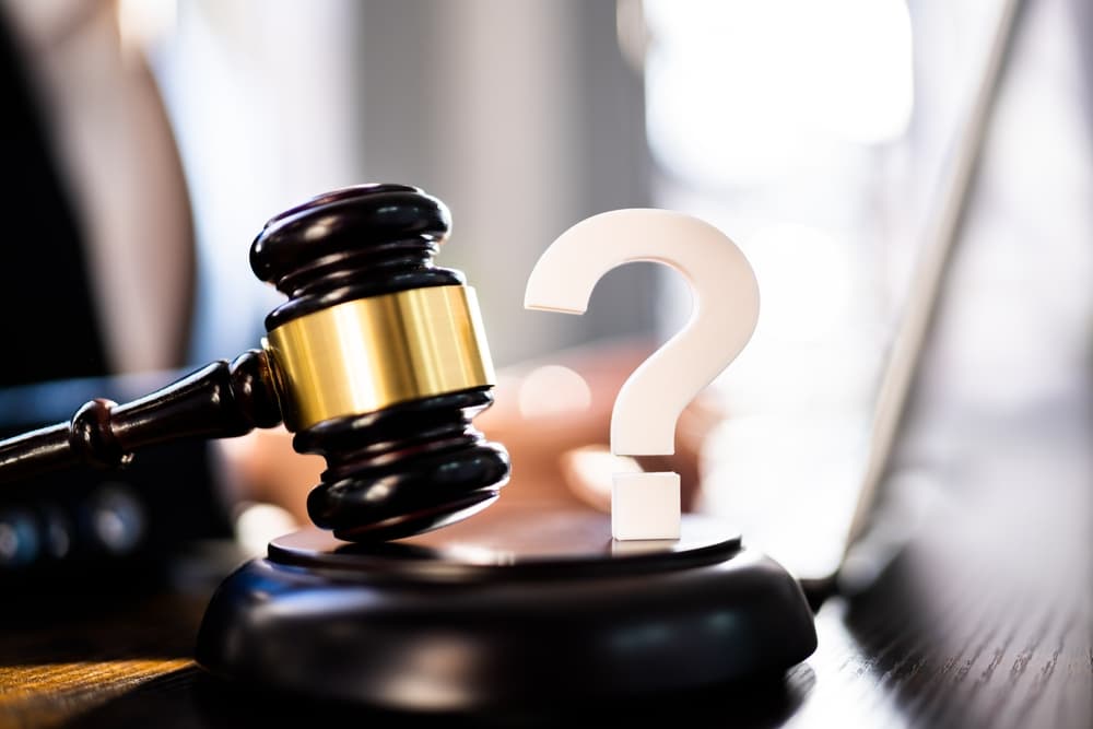 Judge's Gavel and Question mark symbol